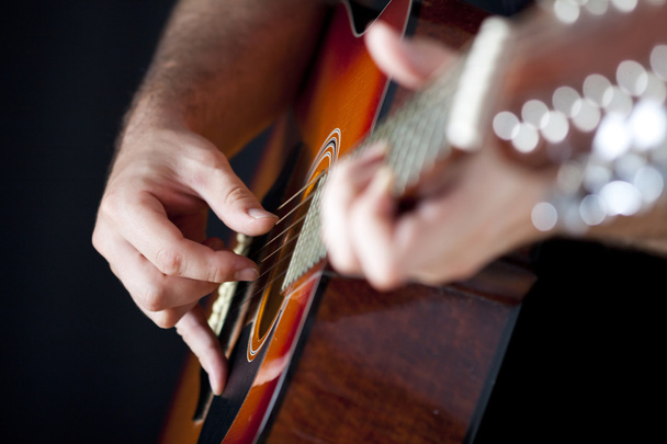 Man playing guitar - Fotó, kép