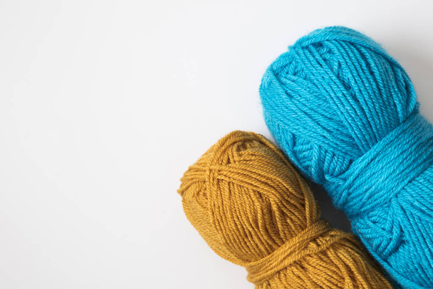 Colored balls of knitting wool yarn. View from above. - 写真・画像