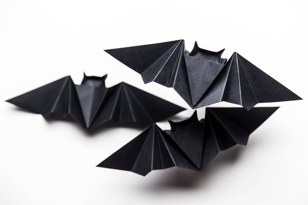 Halloween origami paper dracula bats on a white background - Фото, зображення