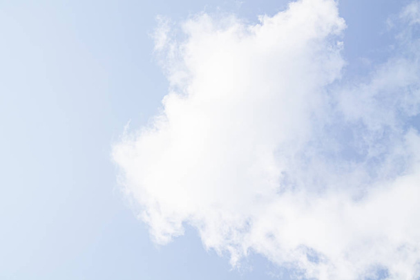white clouds against the blue sky. - Valokuva, kuva