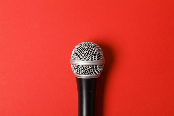 microphone on a bright red background. - Foto, Imagem