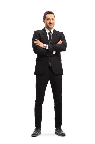 Busniessman wearing a black suit and posing with arms crossed - Foto, Imagem