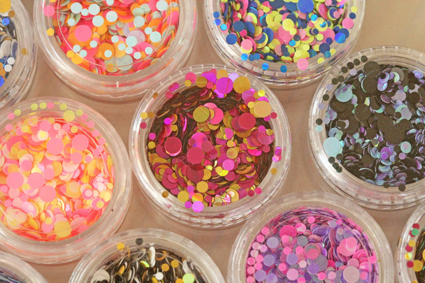 Multi colored Sequins for the design of nails in a Jar. Glitter  - Foto, immagini