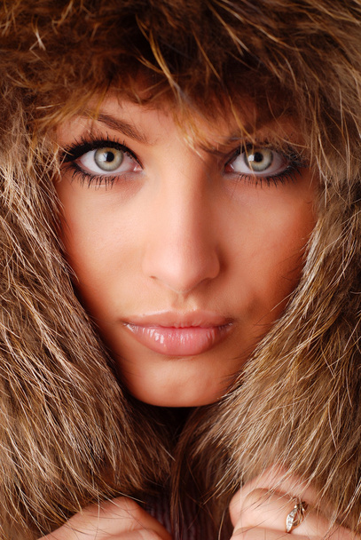 Woman in fur cap - Фото, зображення