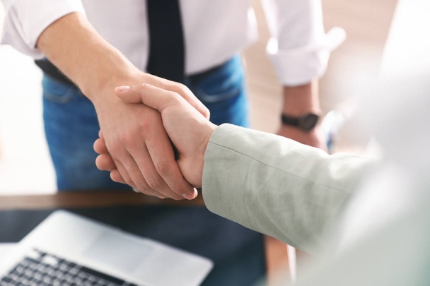 Business partners shaking hands after meeting, closeup - Foto, Imagem