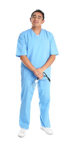 Full length portrait of male Hispanic doctor isolated on white. Medical staff - Valokuva, kuva