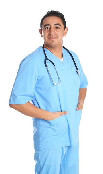 Portrait of male Hispanic doctor isolated on white. Medical staff - Zdjęcie, obraz