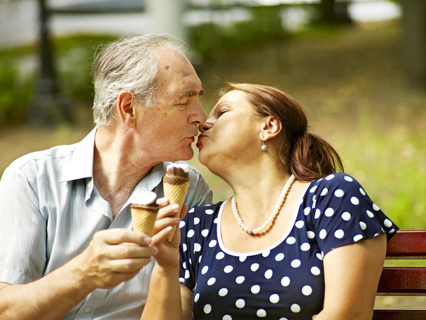 Happy old couple with ice-cream. - Photo, Image