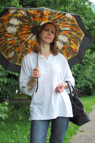 Donna con un Ombrellone
 - Foto, immagini