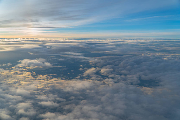 sunrise in the sky is beautiful on the atmosphere above the white clouds. - Photo, Image