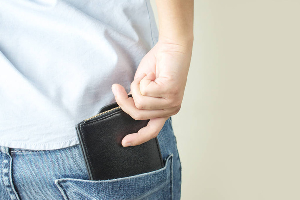 Purse in your back pocket with isolated on background - Photo, Image
