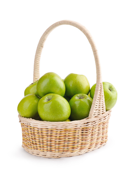 Fresh green apples in a basket isolated on a white background - Photo, image