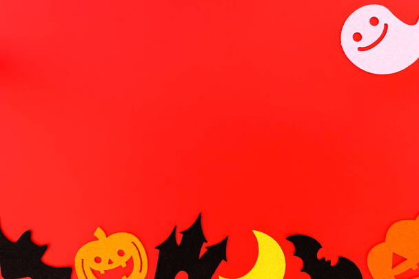 Halloween holiday decorations on red background,  - Photo, Image
