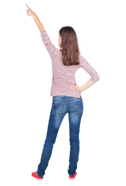 Back view of pointing woman. - Valokuva, kuva