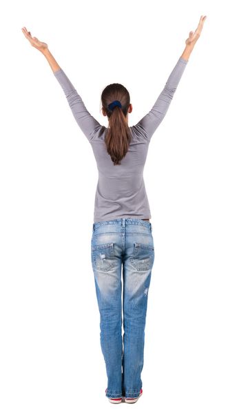 Back view of Beautiful woman in jeans - Fotoğraf, Görsel