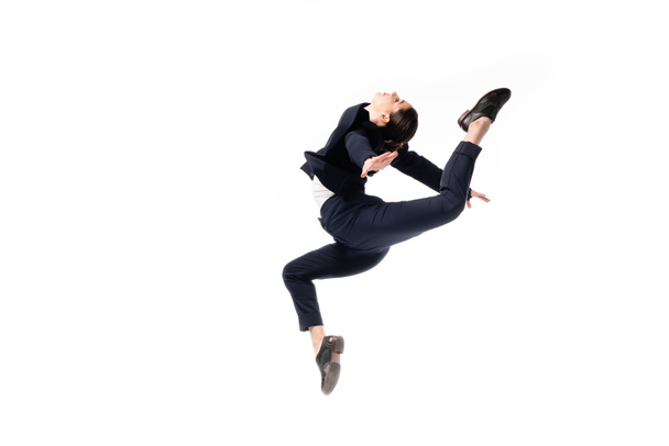 graciosa empresária em uso formal pulando em dança isolada no branco
 - Foto, Imagem