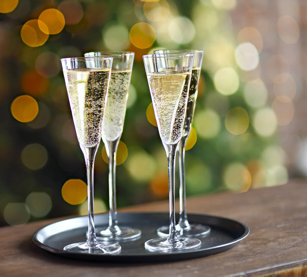 Champagne glasses on lights background. Celebration background - Photo, Image