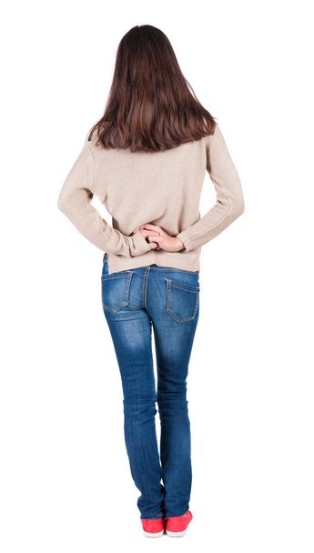 back view of standing young beautiful brunette woman. - Foto, Imagem