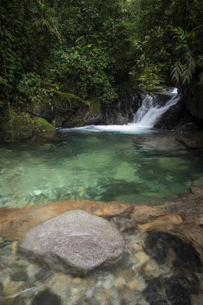 Beautiful landscape of crystal clear water river and waterfall i - Foto, imagen