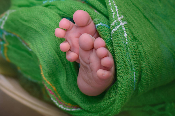 Photo of newborn baby feet, soft focus. - Fotó, kép
