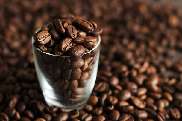 Coffee beans in a glass Cup - Photo, Image