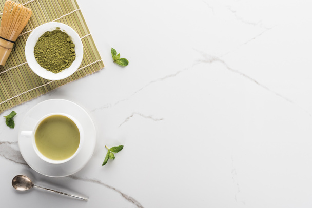 top view of green matcha tea on white table with copy space - Photo, Image