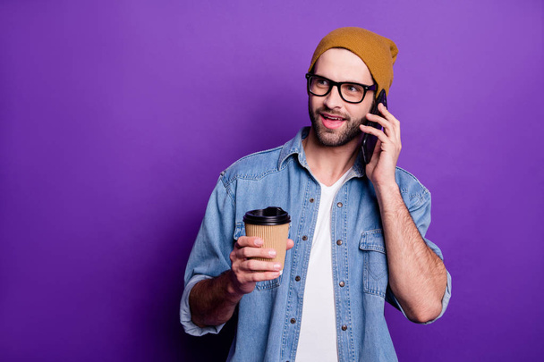 Amazing guy speaking over telephone best friend wait meeting casual dressed isolated violet background - Фото, изображение