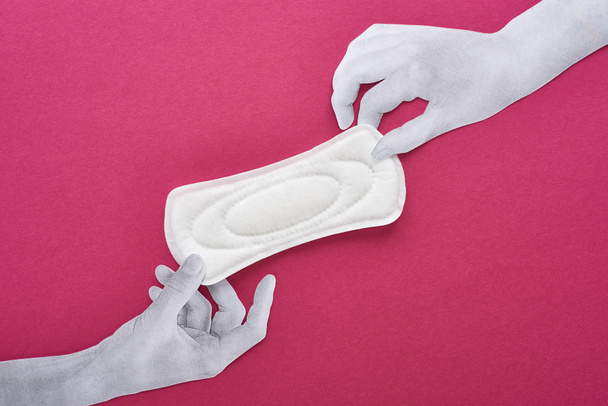 vue du dessus des mains blanches coupées en papier et serviette hygiénique blanche sur fond violet
 - Photo, image