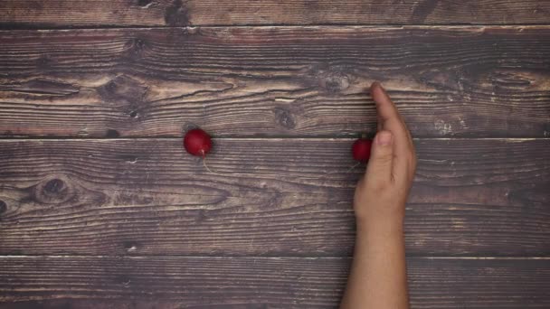 Radish coming out from man's hand and transform into apple - Stop motion animation video  - Záběry, video