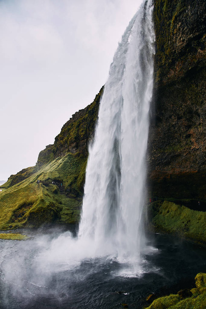 Fantastic Seljalandsfoss waterfall in Iceland during sunny day. - Φωτογραφία, εικόνα
