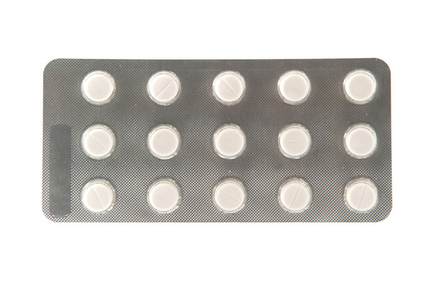 einfache Tablette in Blisterverpackung auf weißem Hintergrund - Foto, Bild