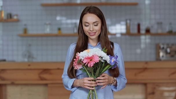 happy beautiful girl holding flowers at home  - Footage, Video