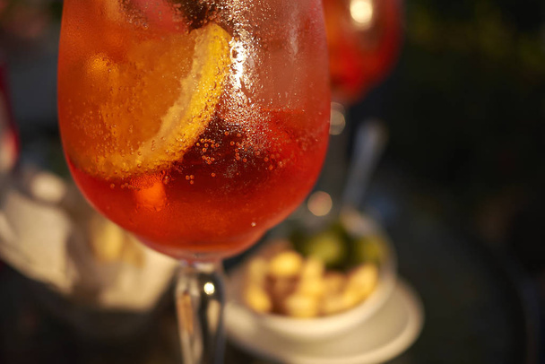 Spritz cocktail glass with ice cubes - Valokuva, kuva