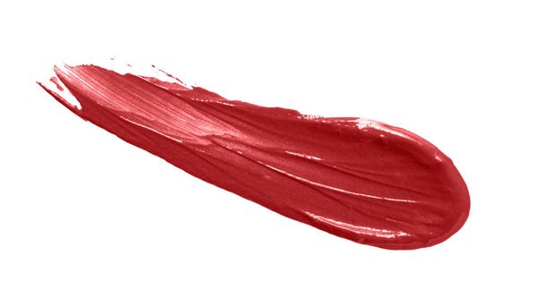 Mancha de mancha de pintalabios rojo mancha aislada sobre fondo blanco. Textura cremosa del maquillaje. Color brillante producto cosmético golpe deslizar muestra
 - Foto, imagen