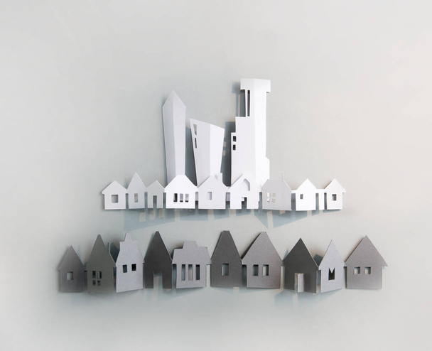 Modern City, skyscrapers and town houses. Property and house buying concept. Paper cut design background. - Foto, imagen