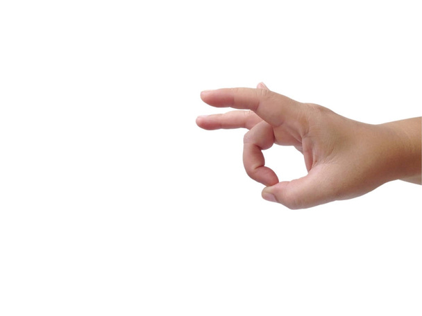 Γυναίκα χέρι εμφάνιση δάχτυλο κλωτσιά σε λευκό φόντο. Σύμβολο του δακτύλου κτύπημα. - Φωτογραφία, εικόνα