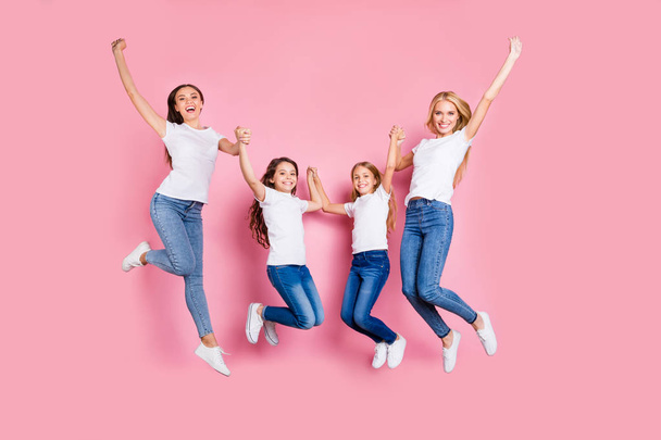 Full length body size view of nice attractive lovely charming slim fit thin graceful cheerful cheery glad excited girls having fun spending holiday weekend rejoicing isolated over pink background - Foto, imagen