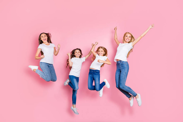 Full length body size view of four nice attractive adorable slim fit cheerful glad overjoyed excited long hair girls having fun rejoicing funky mood attainment motherhood isolated on pink background - Fotografie, Obrázek