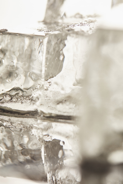 close up view of pure transparent wet textured ice cubes - Zdjęcie, obraz