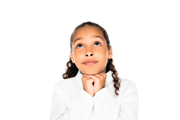adorable african american schoolgirl looking up and showing please gesture isolated on white - Fotoğraf, Görsel