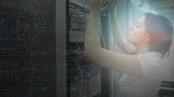 Animation of a Caucasian woman plugging in cables in a computer server room, turning and smiling to camera, while a motherboard with glowing elements scrolls in the foreground - Video