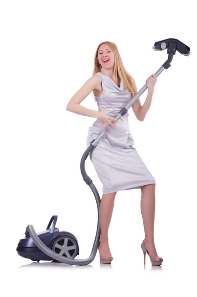 Young woman with vacuum cleaner on white - Foto, Bild