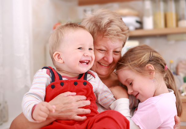 Happy children with granny - Fotó, kép
