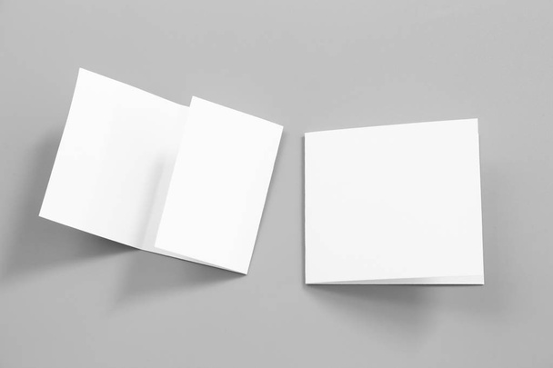 Blank portrait mock-up paper. brochure magazine isolated on gray, changeable background / white paper isolated on gray - Foto, immagini