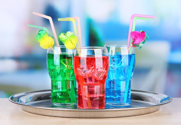 Different cocktails on bright background - Φωτογραφία, εικόνα