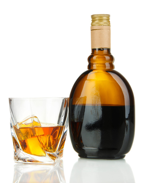 Glass of liquor with bottle, isolated on white - Foto, Imagem