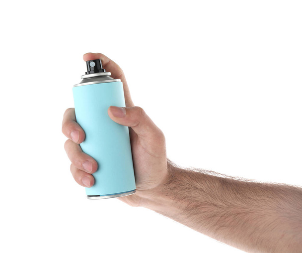 Man holding spray deodorant on white background, closeup - Foto, Imagem