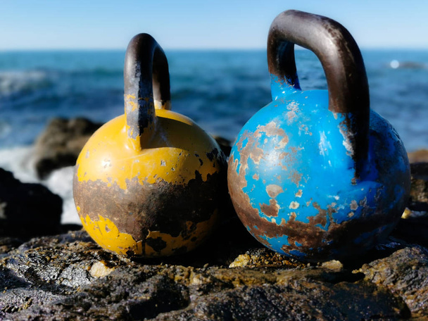 Two Isolated Kettlebells on the Beach - Photo, Image
