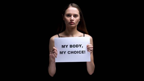 Woman showing my body my choice sign, body positivity, human rights freedom - Foto, Imagem