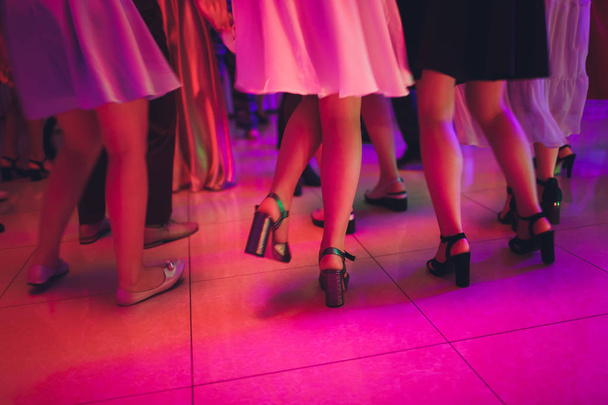 Close up of elegant female legs walking away. - Valokuva, kuva